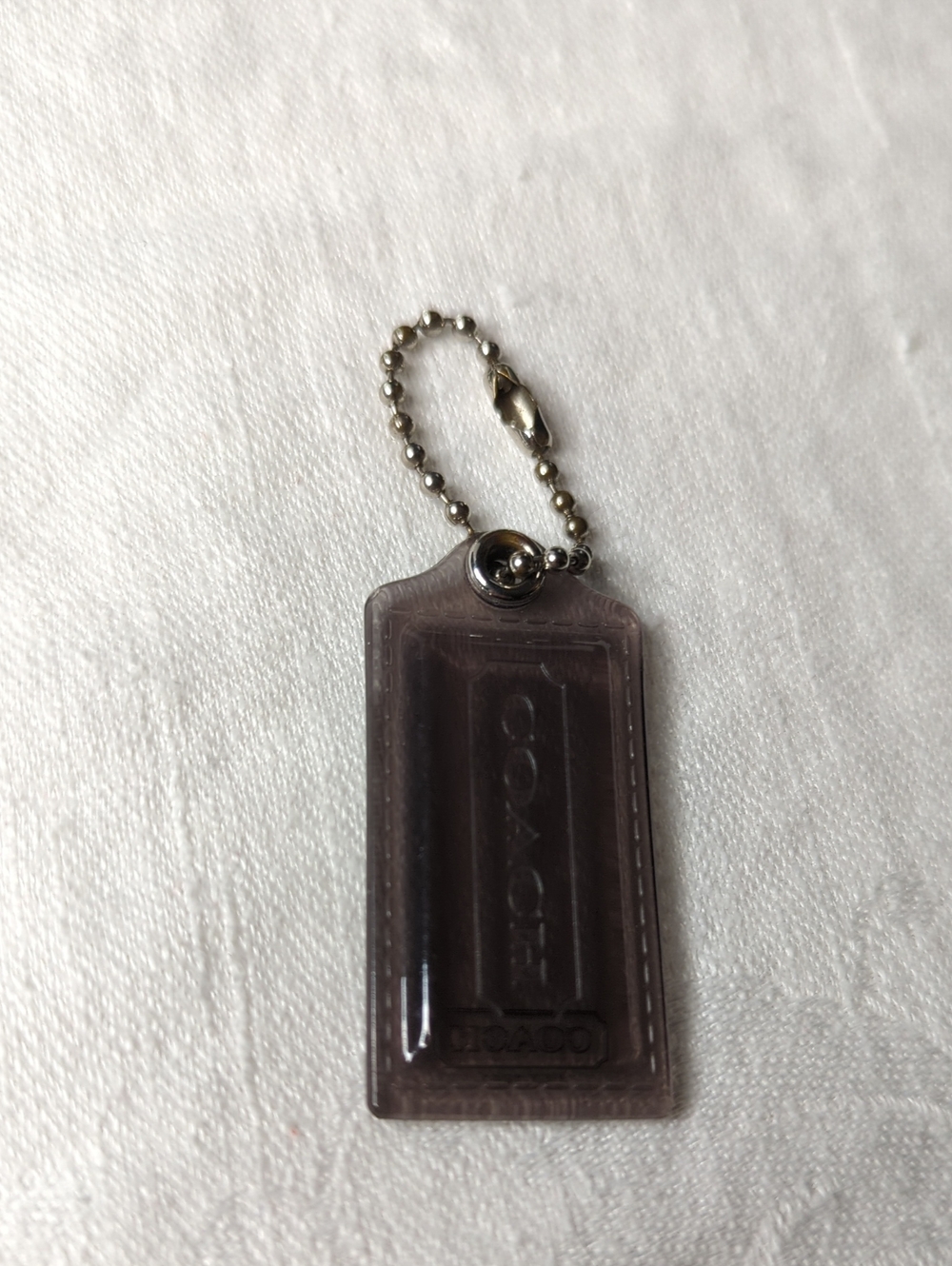 (0017) COACH Smoke PVC Hang Tag
